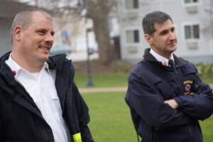 Hyannis Fire Captain Web and Chief Burke smiling at a comment