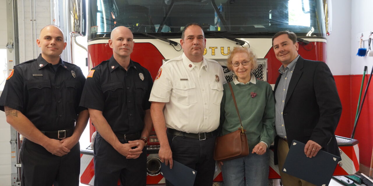 Three Cotuit Fire Department members were recognized for life saving efforts they provided to a local resident.