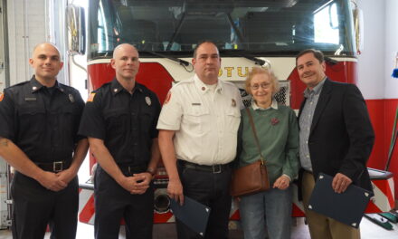 Three Cotuit Fire Department members were recognized for life saving efforts they provided to a local resident.